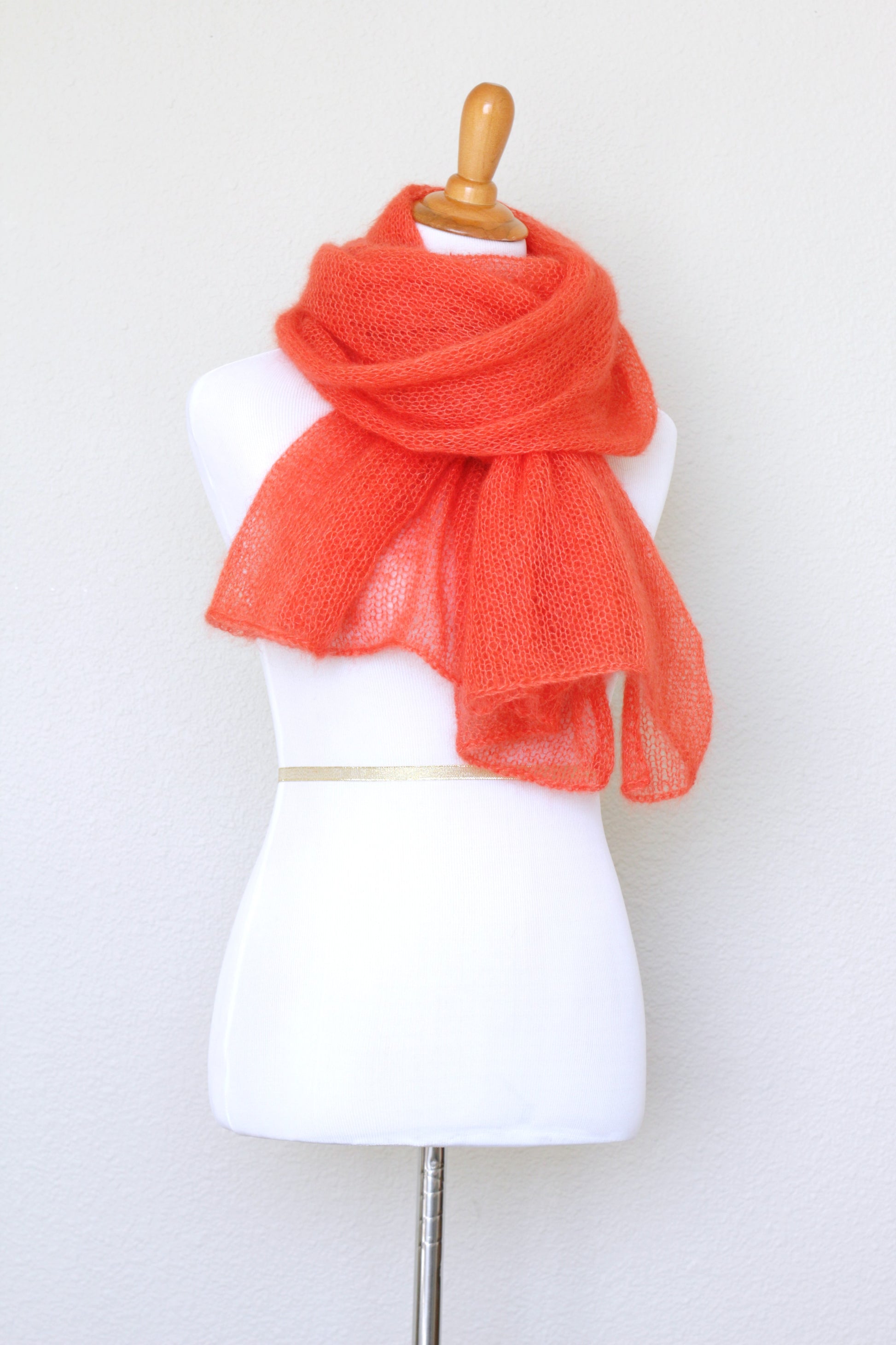 Knit scarf in silk mohair blend in burnt orange red color