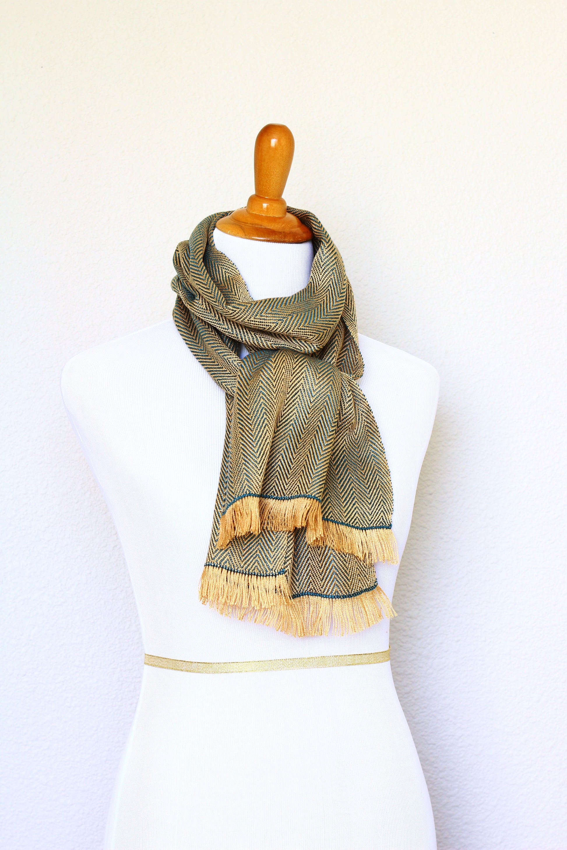 Woven scarf in gold and teal colors with twill pattern, Eucalyptus scarf with fringe