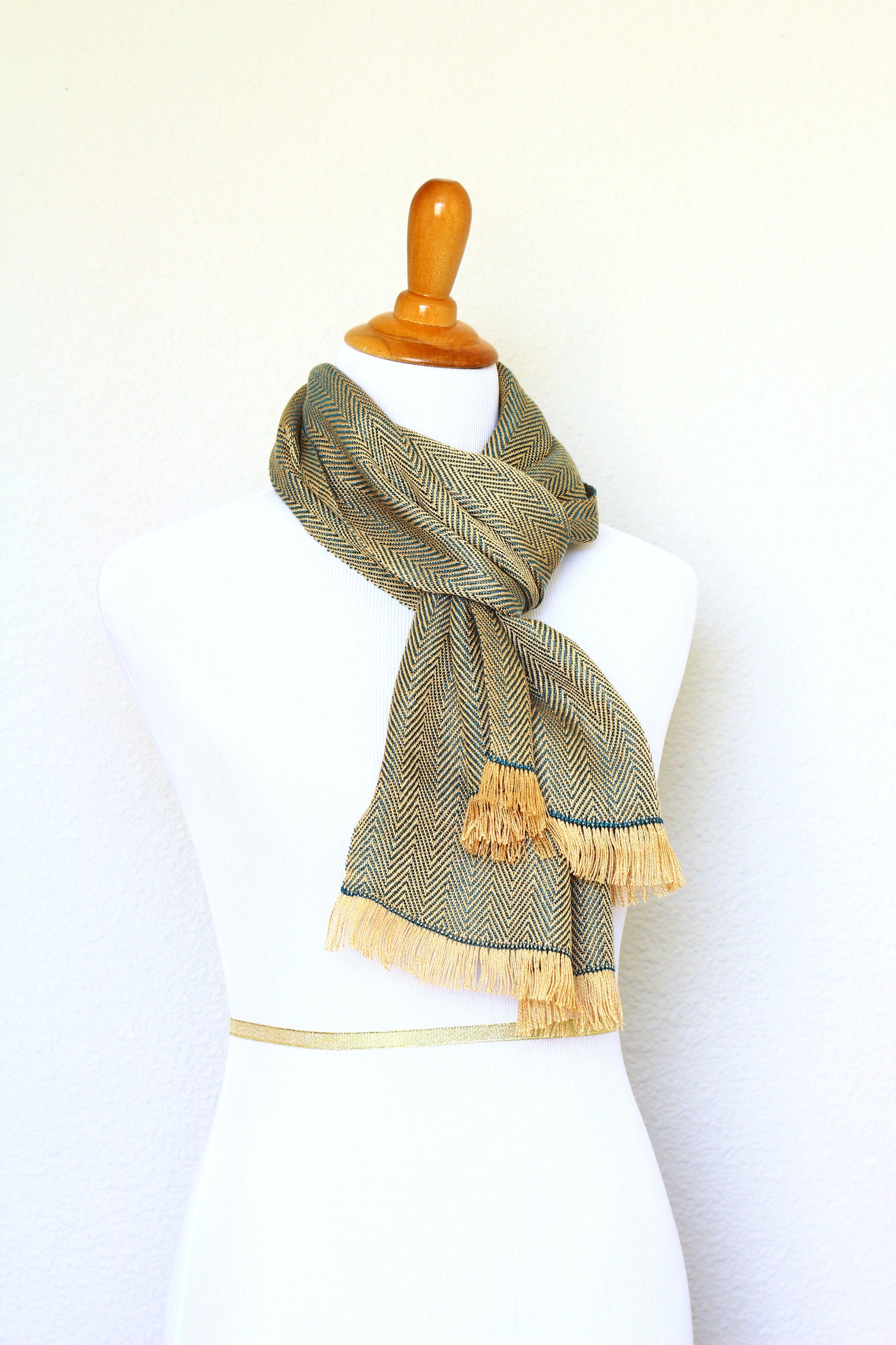 Woven scarf in gold and teal colors with twill pattern, Eucalyptus scarf with fringe