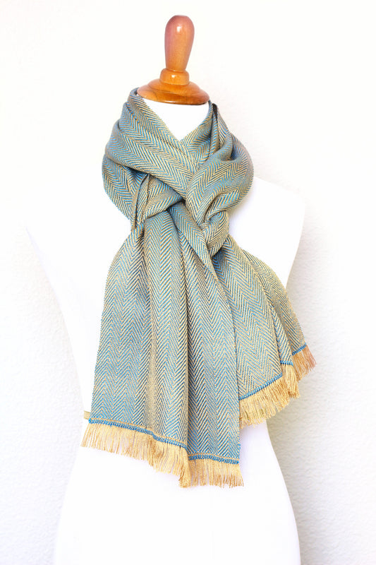 Woven scarf in gold and blue color with twill pattern, long scarf with fringe