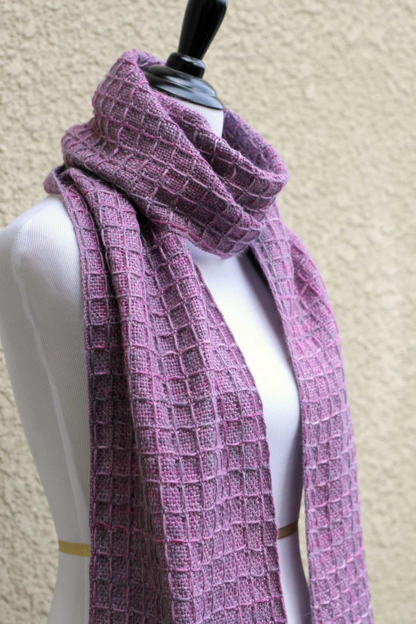 Hand woven scarf in lilac violet colors with waffle pattern