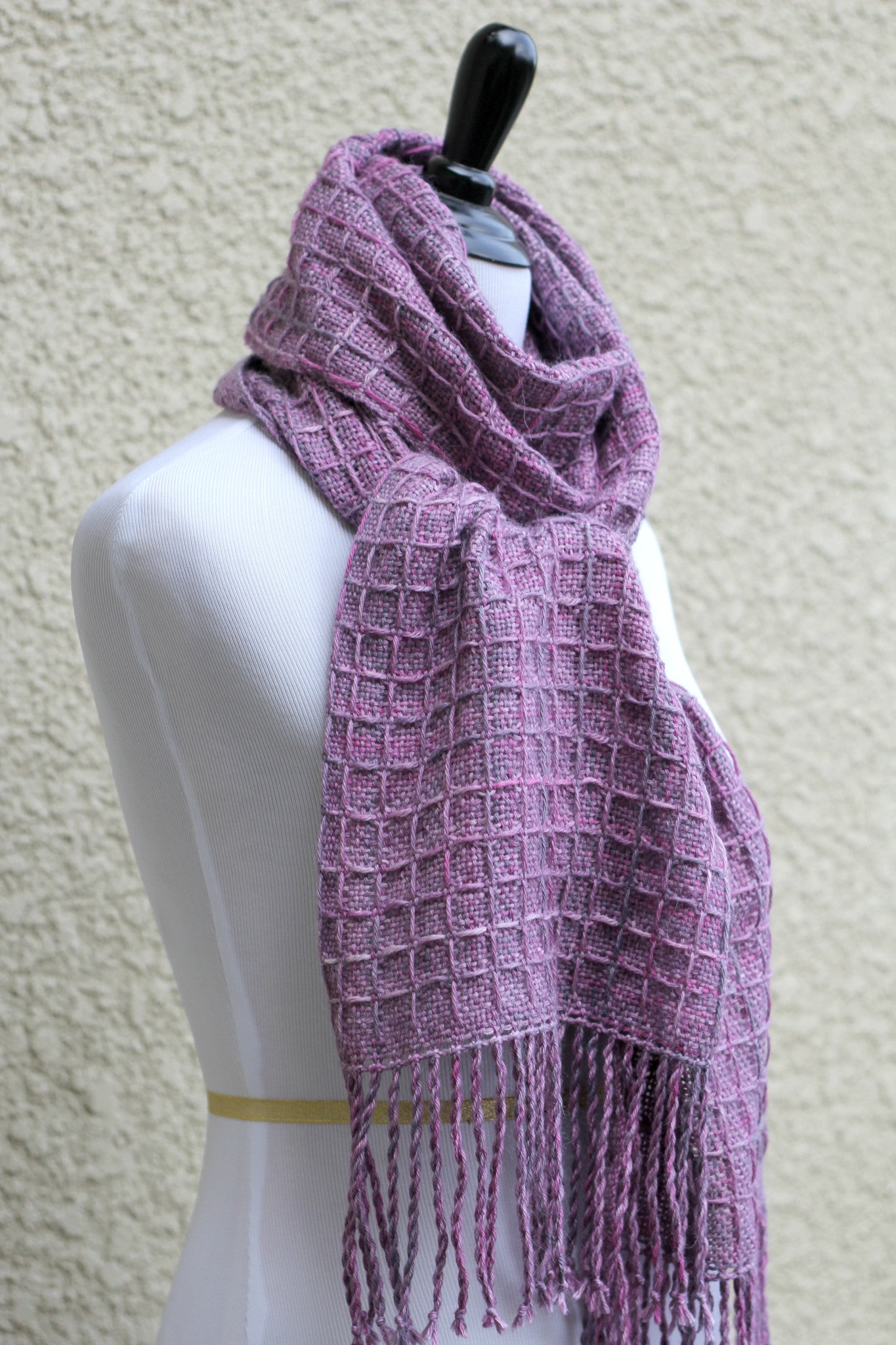 Hand woven scarf in lilac violet colors with waffle pattern