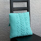 Knit cabled pillow cover with nupps for home decor