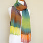 Woven scarf in blue, orange, purple and yellow colors with twill pattern and twisted fringe