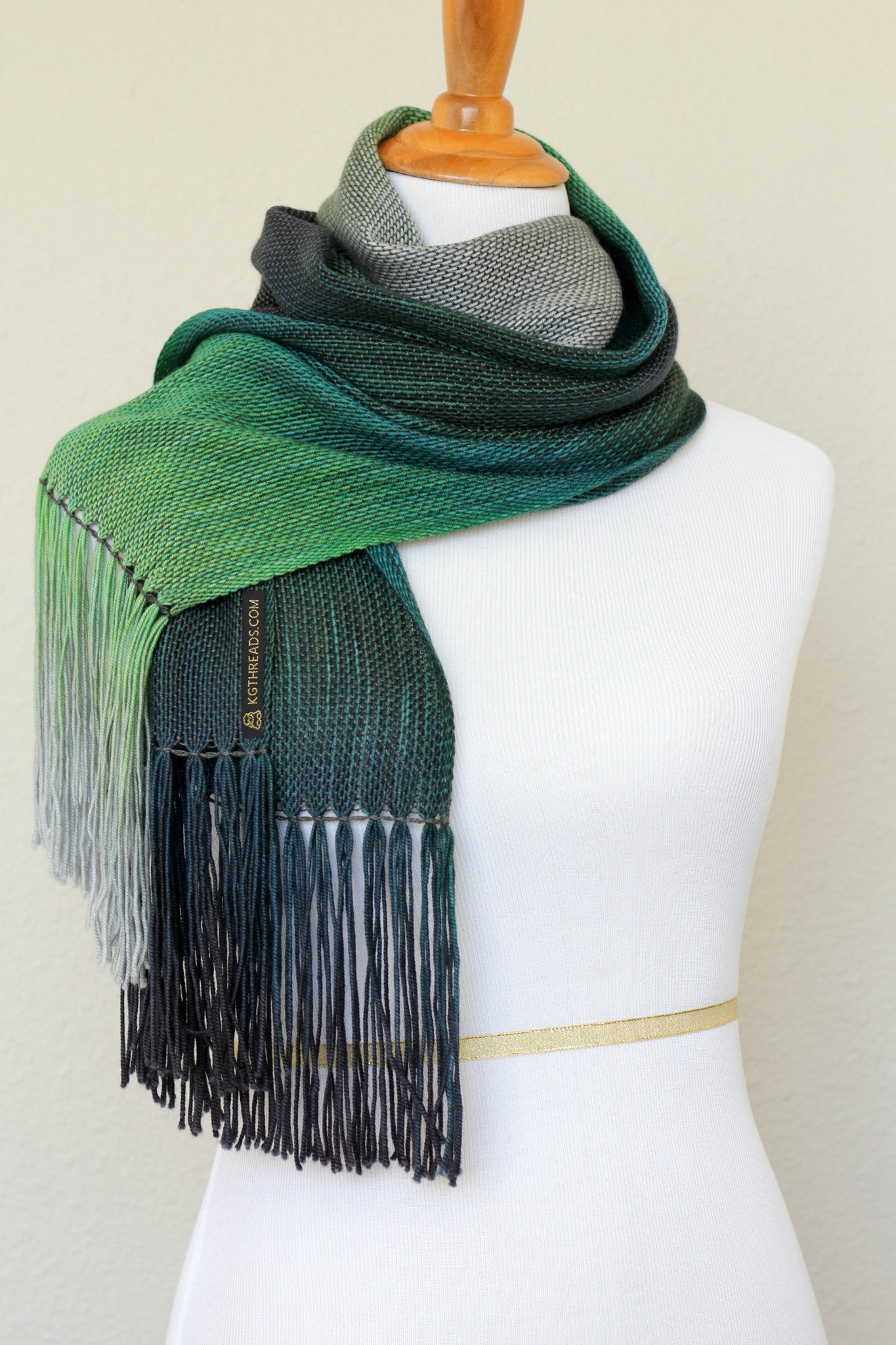 Woven scarf in green and grey colors, woven wrap
