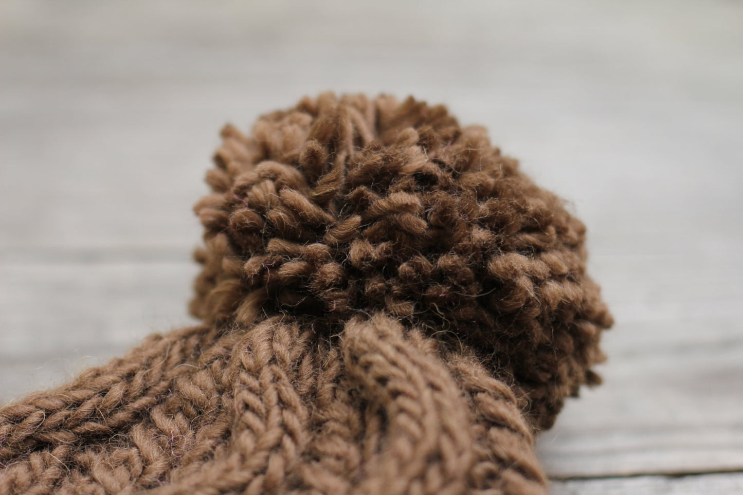 Knit hat with pom pom