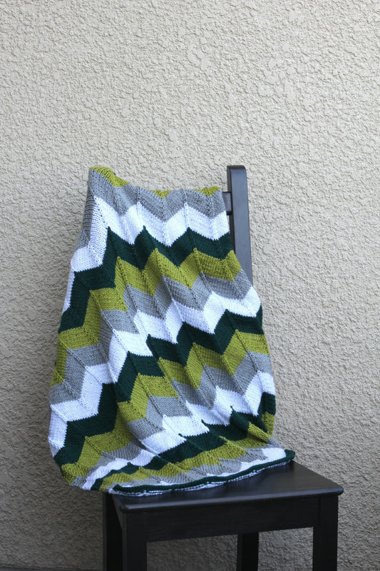 Green and grey baby blanket