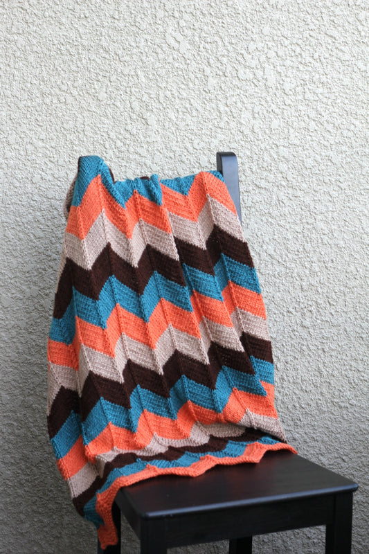 Orange and teal baby blanket