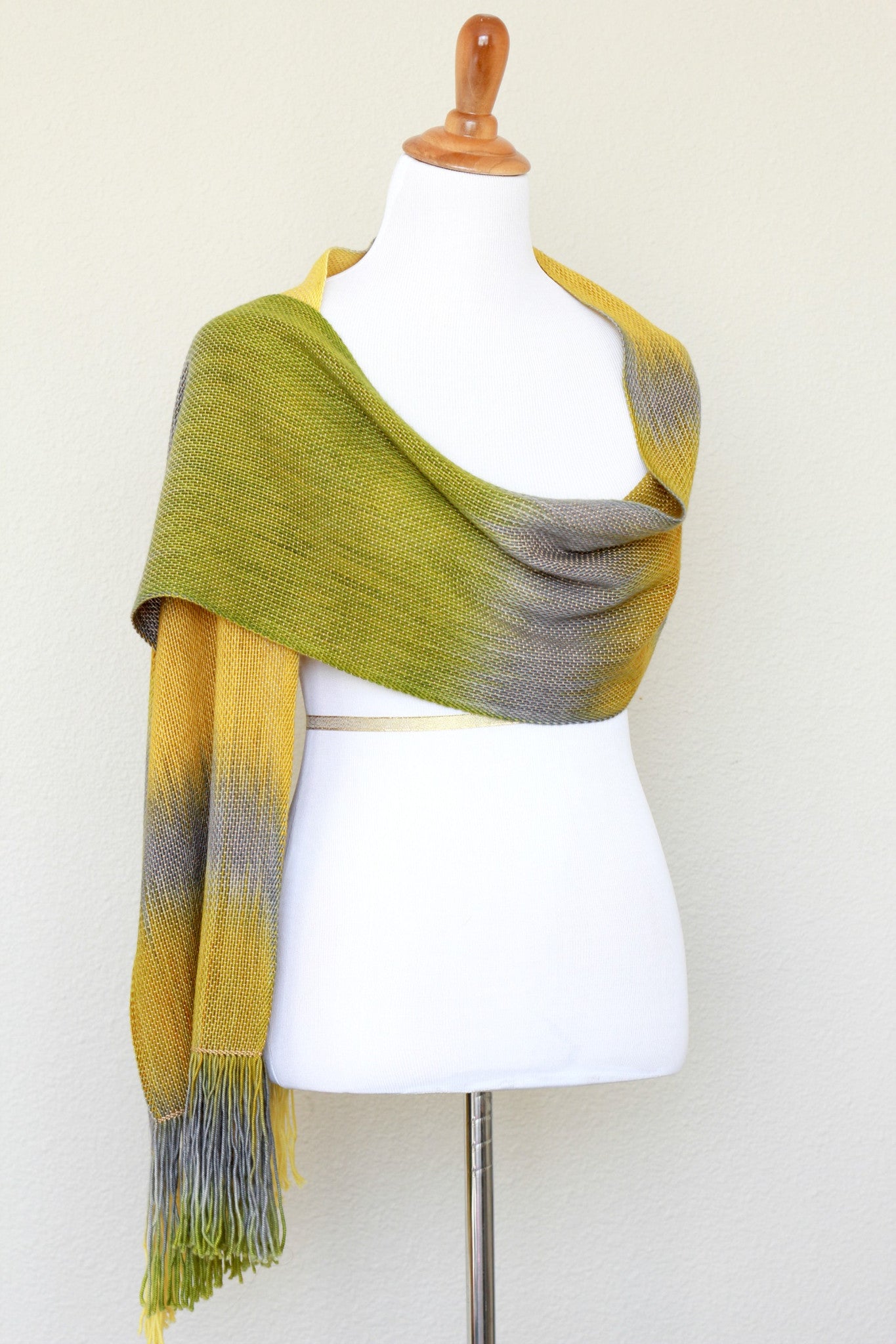 Woven scarf in mustard, green and grey colors