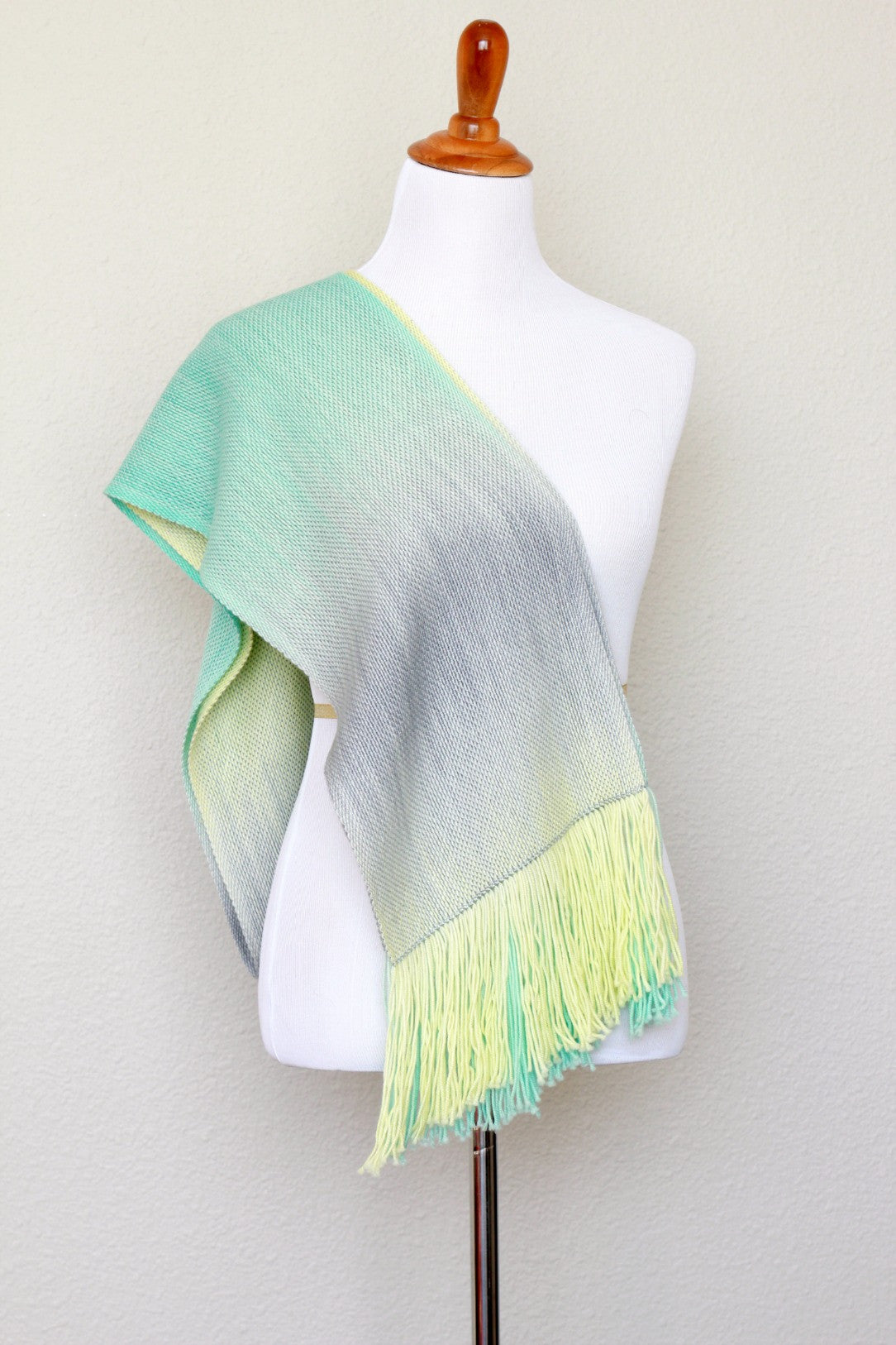 Woven scarf in yellow, green and grey colors