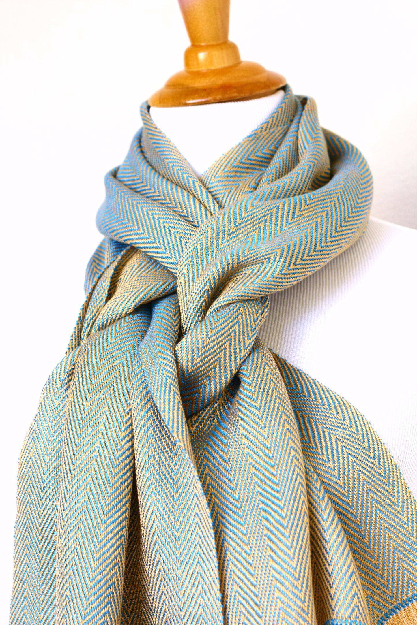 Woven scarf in gold and blue color with twill pattern, long scarf with fringe