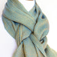 Woven scarf in gold and blue color with twill pattern, long scarf with fringe