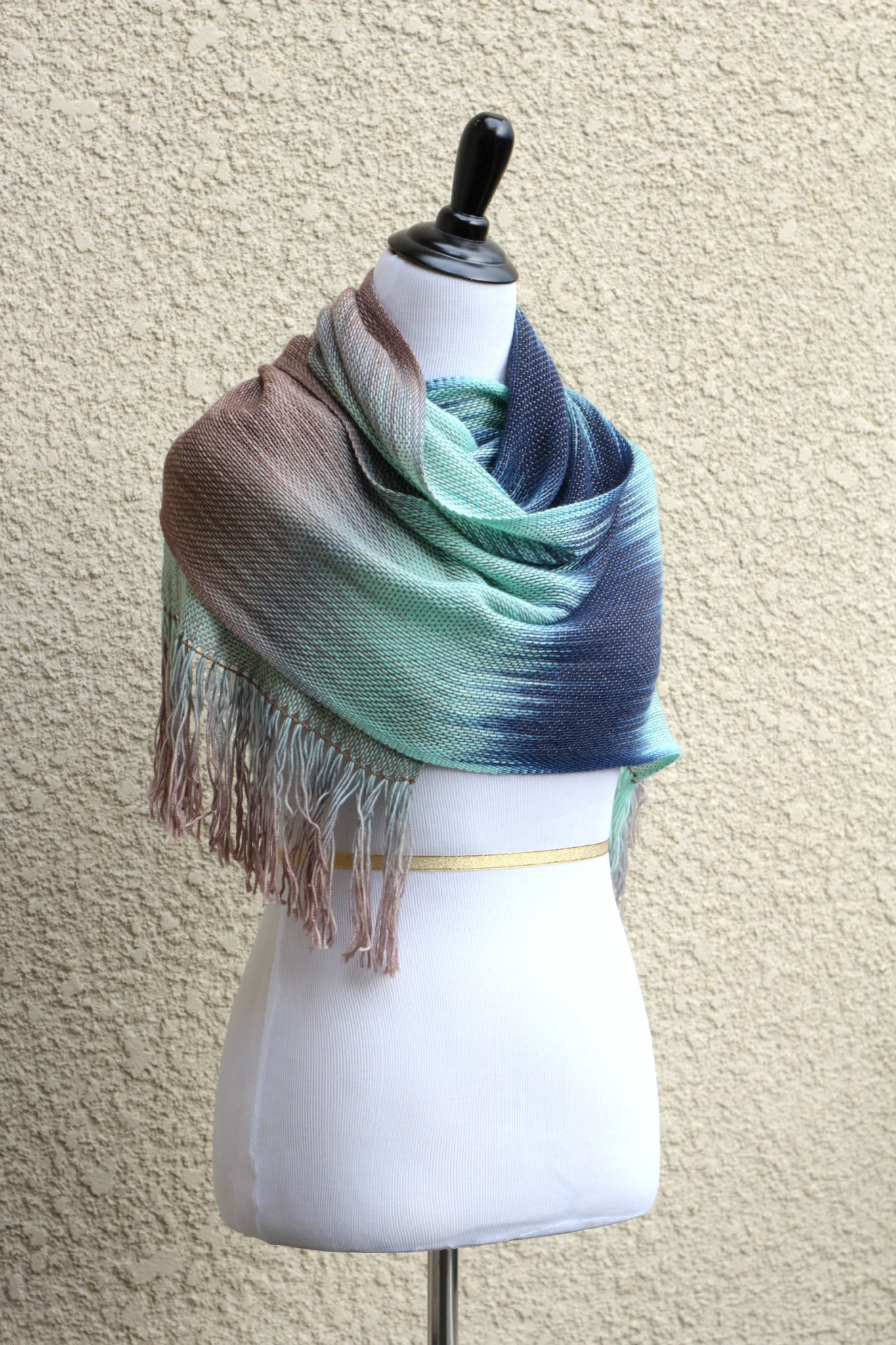 Woven scarf in mint, beige and blue colors