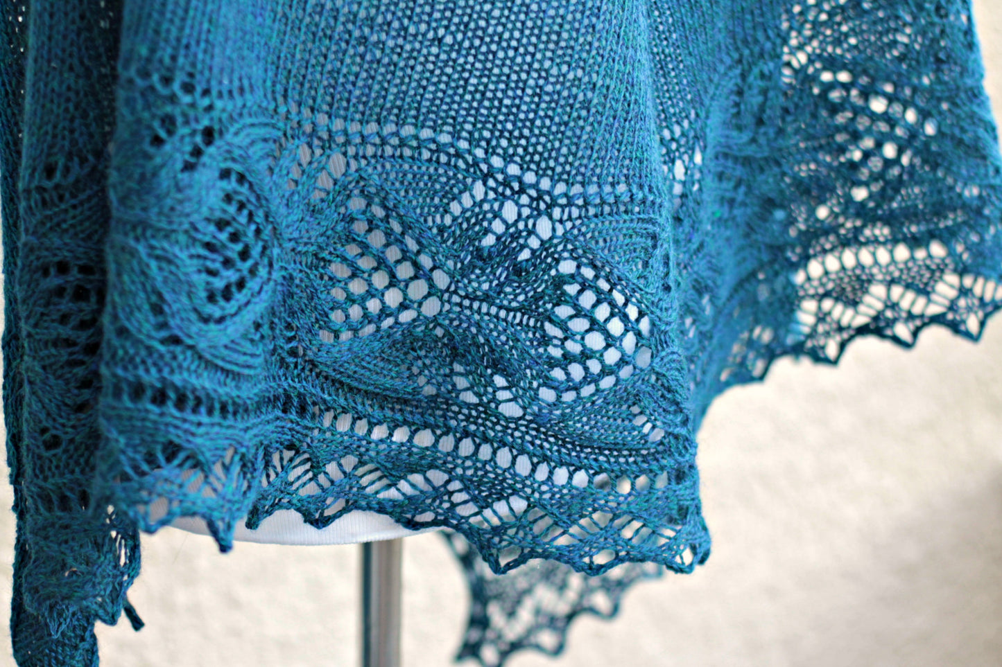 Teal knit shawl woth lace edge