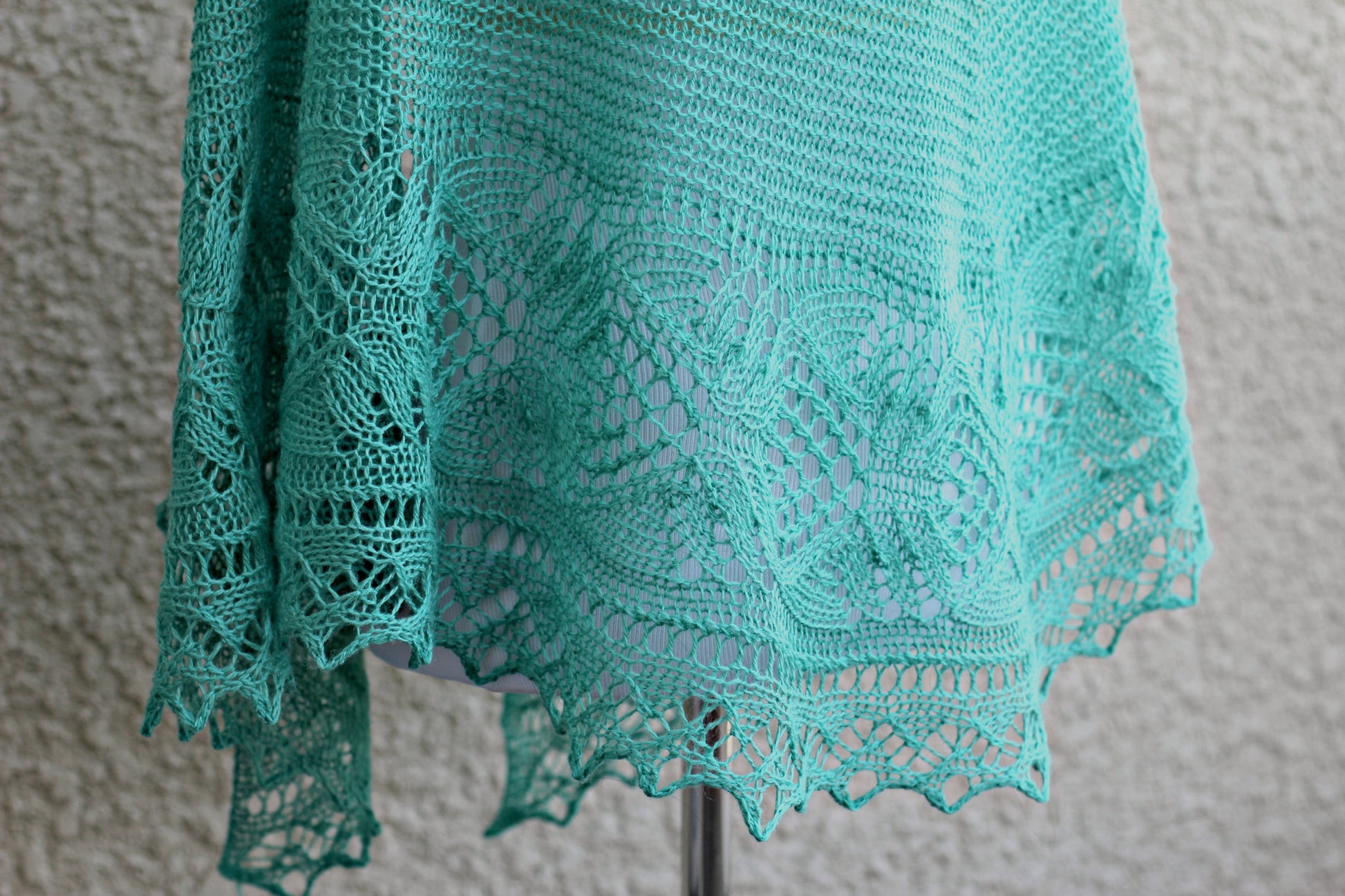 Knit shawl with lace border