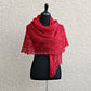Knit shawl with laced border in red color