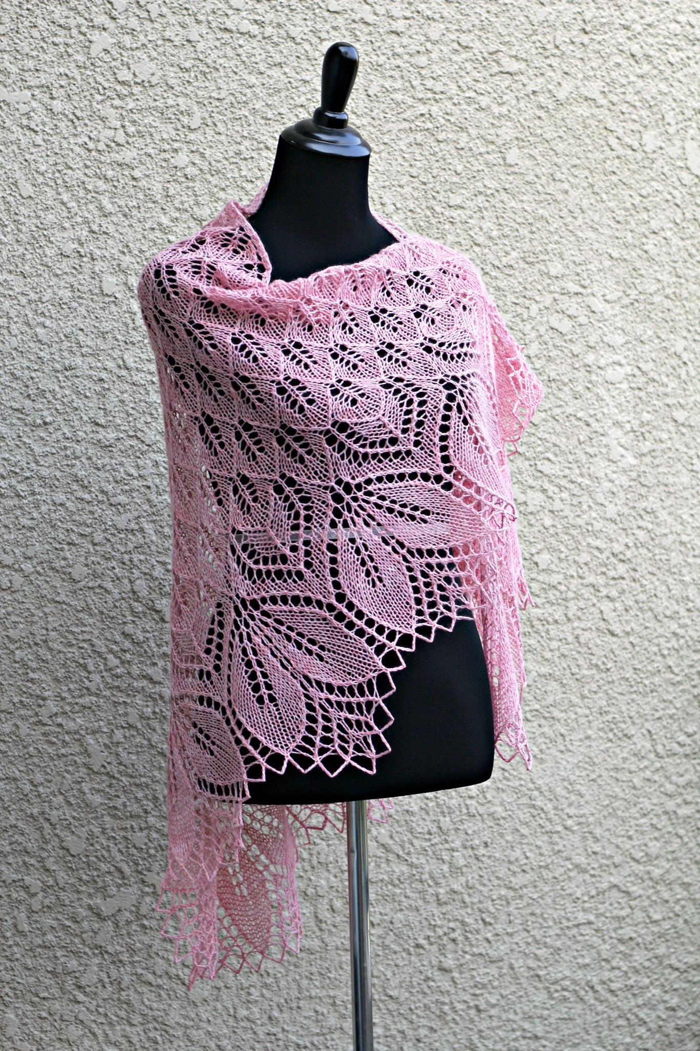 Pink knitted shawl