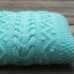 Knit cabled pillow cover with nupps for home decor