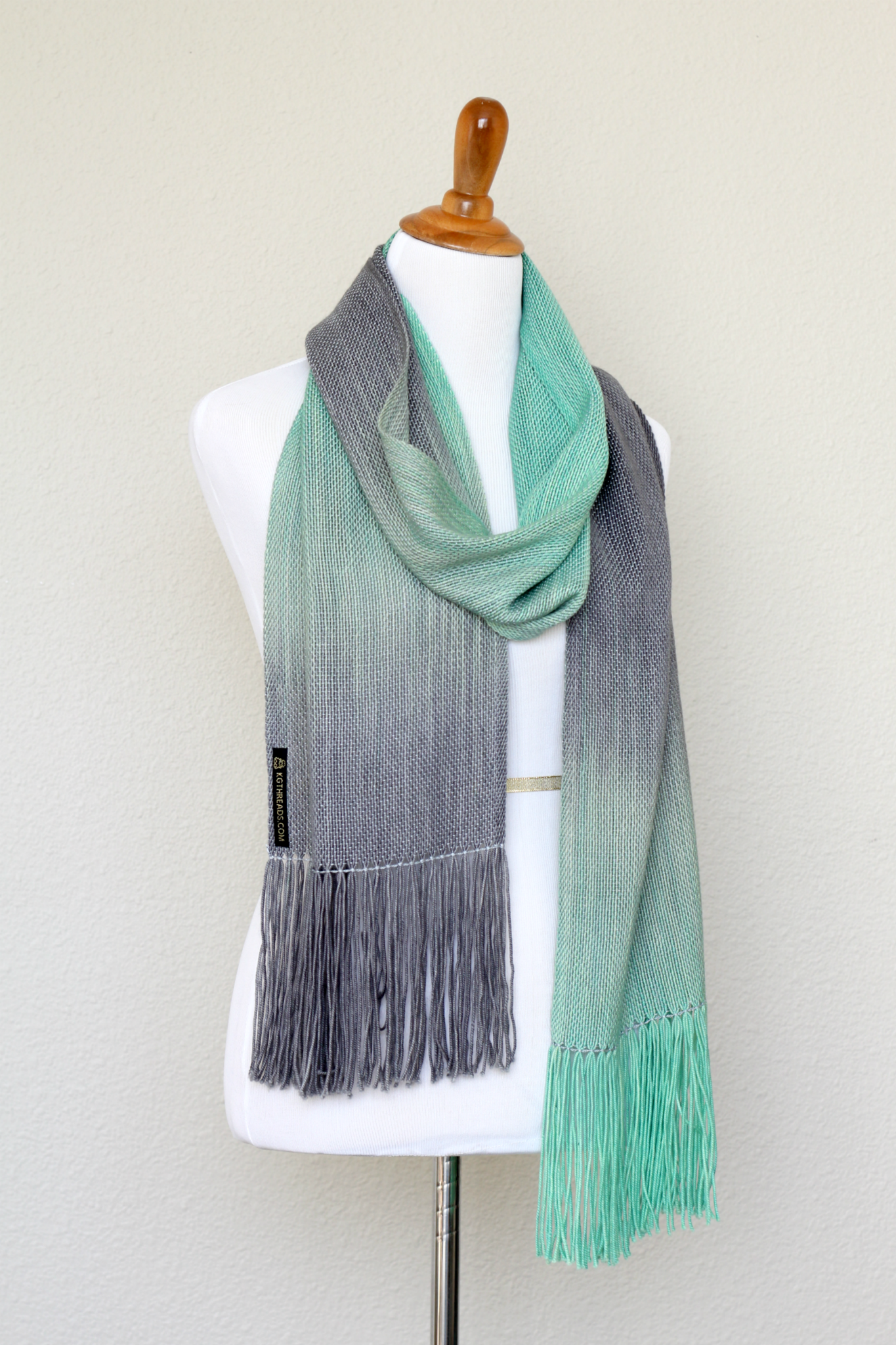 Woven scarf in mint green and grey colors, woven wrap