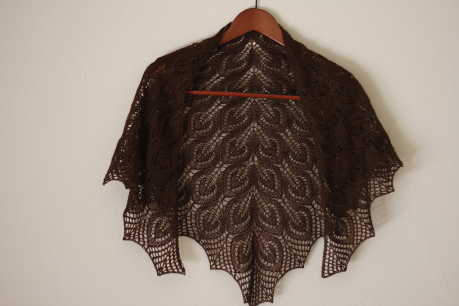Knitted lace shawl in brown color