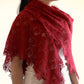 Knit red lace shawl