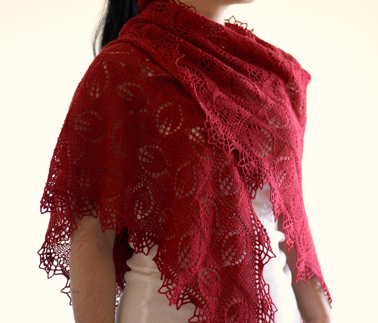Knit red lace shawl