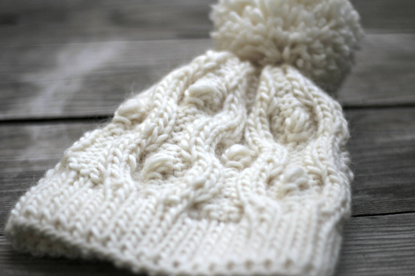 Knit hat in white cream color