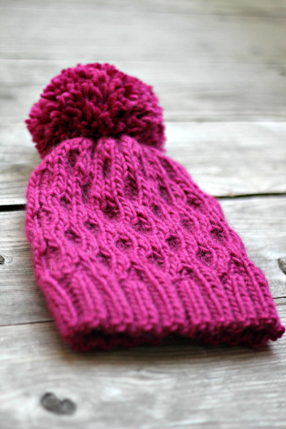 Fuchsia pink knitted hat