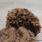 Knit hat with pom pom