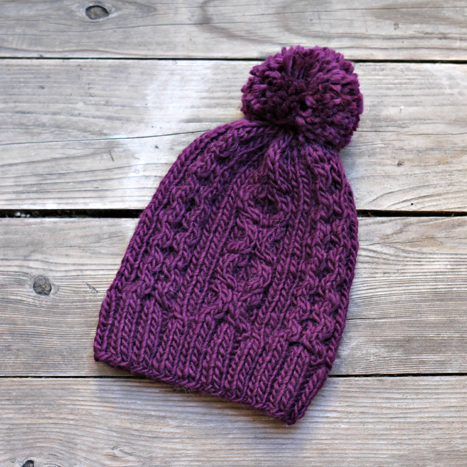 Knit hat with cables pattern
