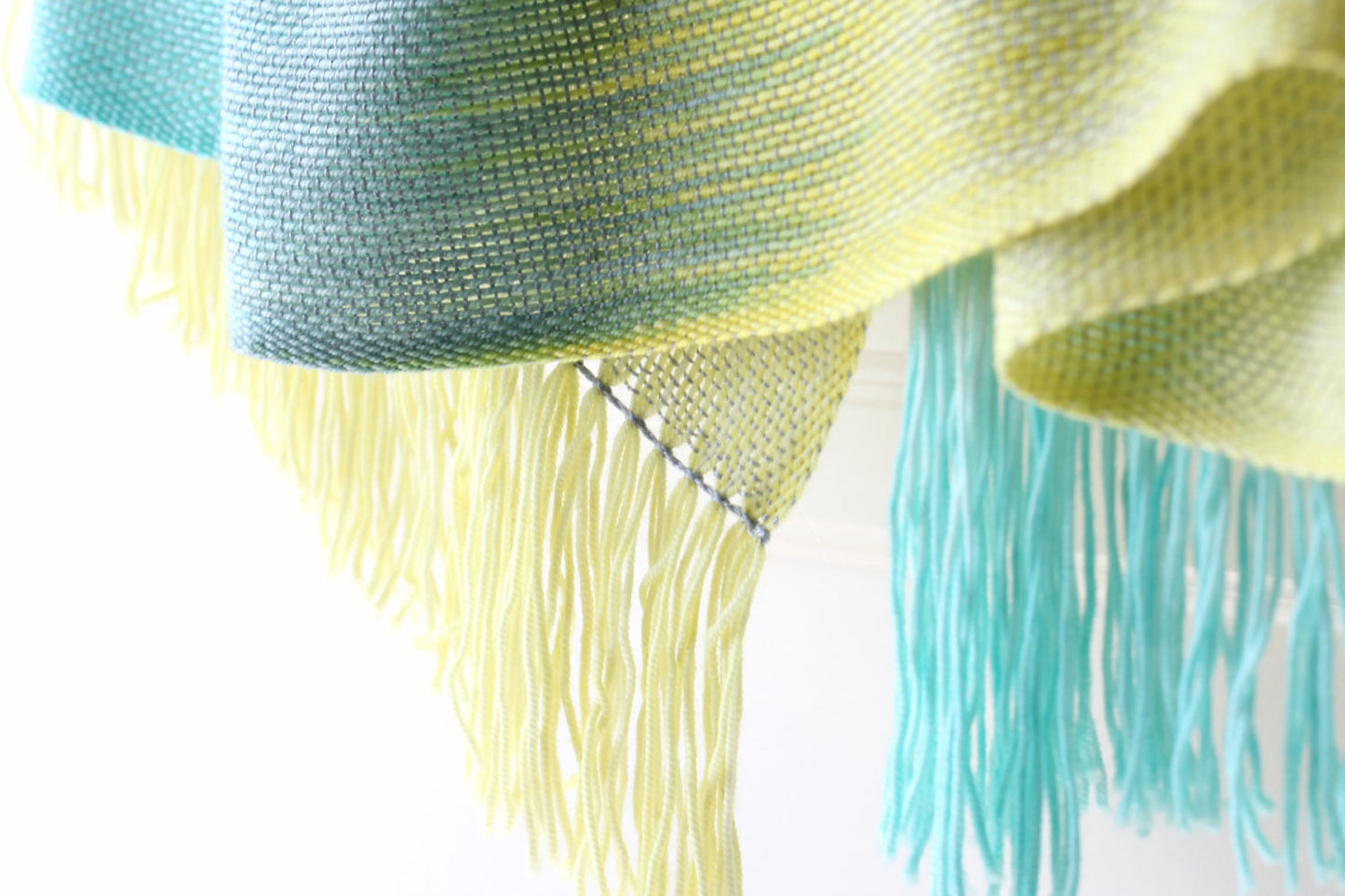 Woven scarf in yellow, green and blue grey colors