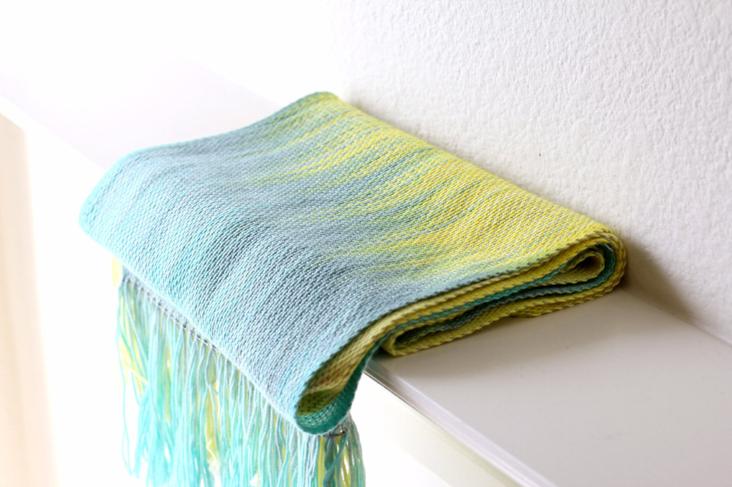 Woven scarf in yellow and grey blue colors