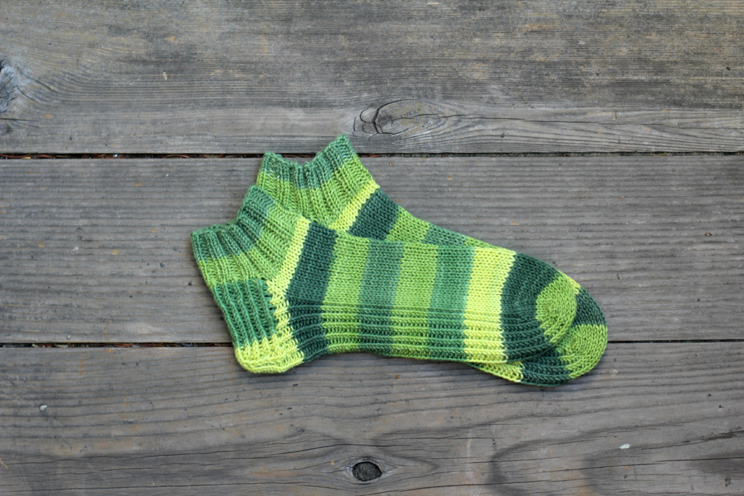 Handknit socks in green color