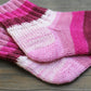 Knit socks with pink stripes