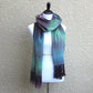 Woven scarf in green, blue and brown colors