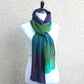 Green and purple woven scarf