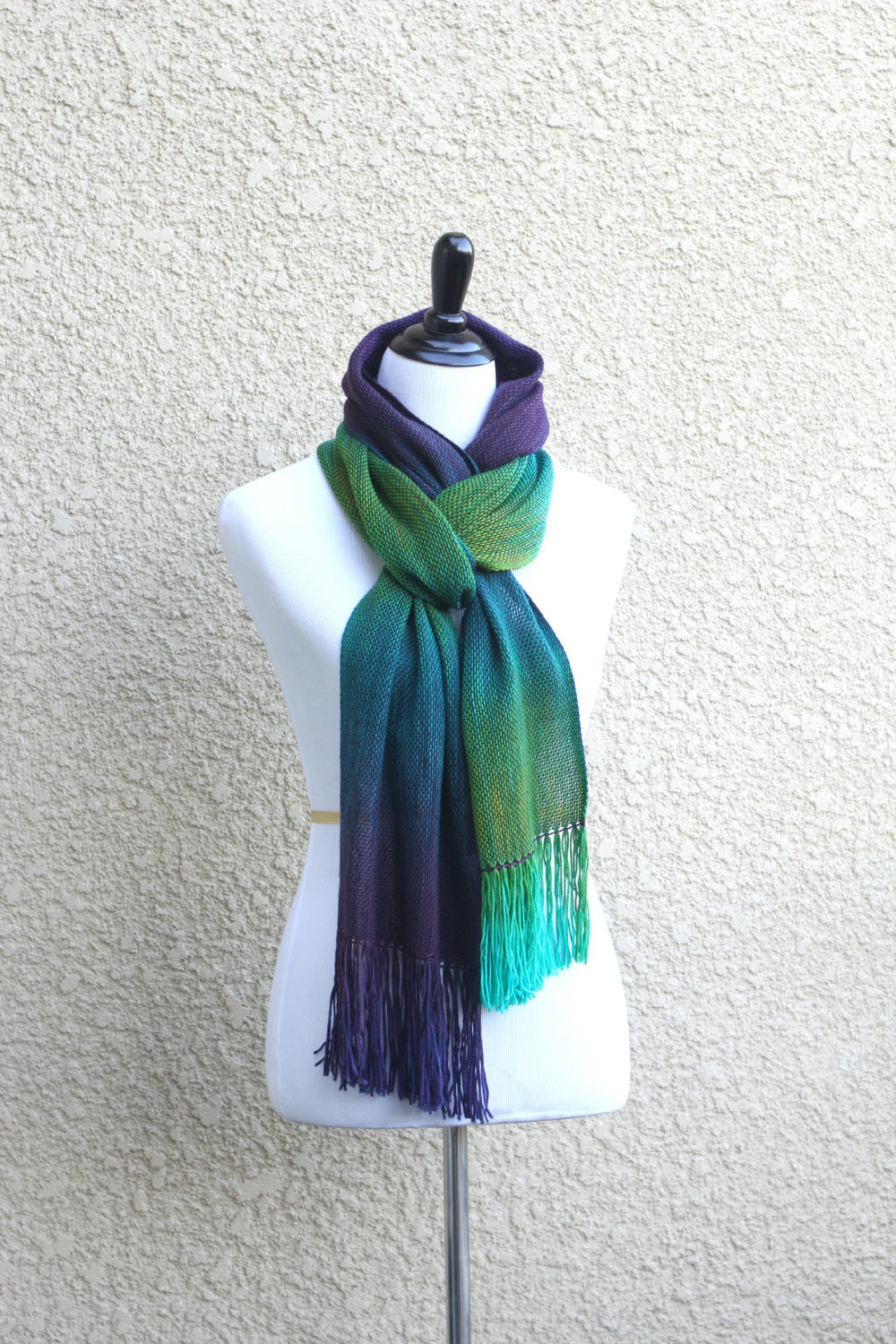 Green and purple woven scarf