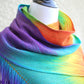 Woven rainbow scarf in red, green, yellow, turquoise and purple