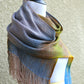 Hand woven wrap in grey and yellow colors
