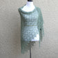 Knitted shawl in olive green
