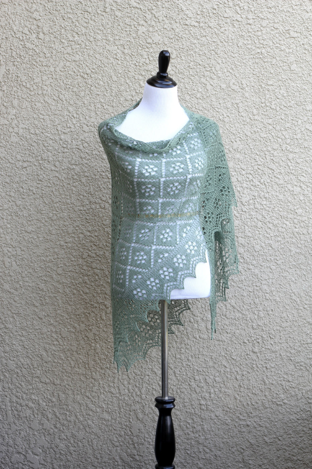 Knitted shawl in olive green