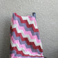 Pink knit baby blanket