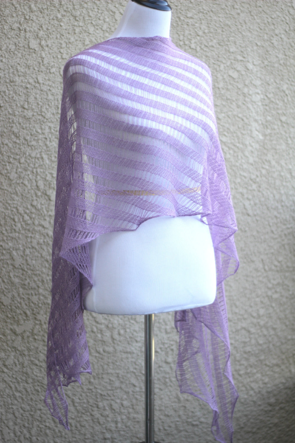 Knitted shawl in lavender color