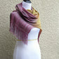 Pink and yellow woven scarf